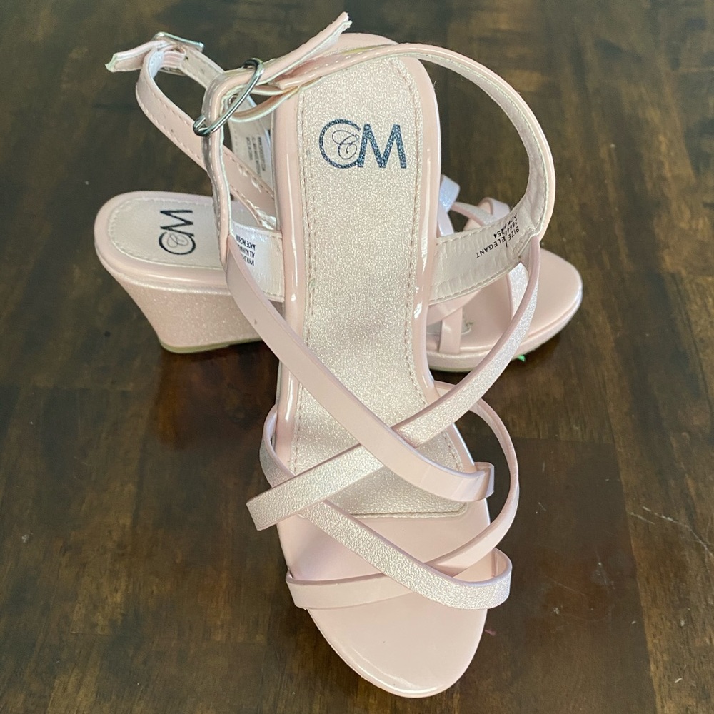 Light pink CCM size 1 girls wedges